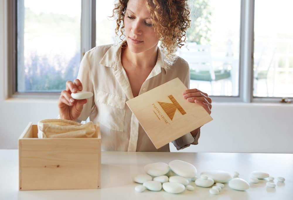 Woman unboxing Parting Stones