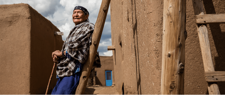 Native American man at a pueblo