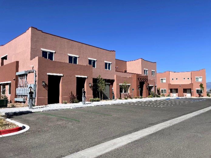 Parking lot in front of townhomes