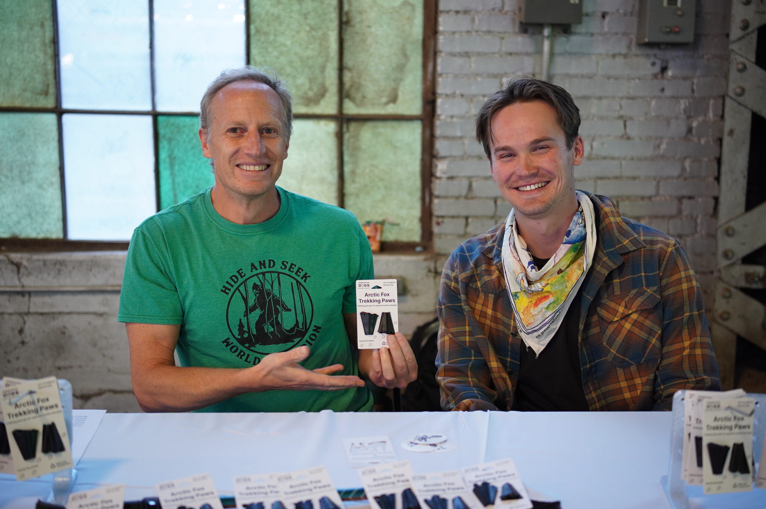 Eric Moffat of Preservation Dogs showcases his upcycled-tire trekking pole tips at Adventure Pitch Fest in 2026.